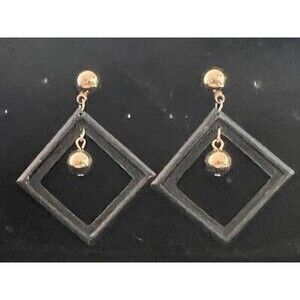 Vintage Black hard plastic with goldtone ball dangle